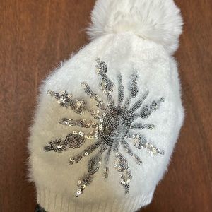 #9– NWT white soft beanie with Pom puff on top and hair hole